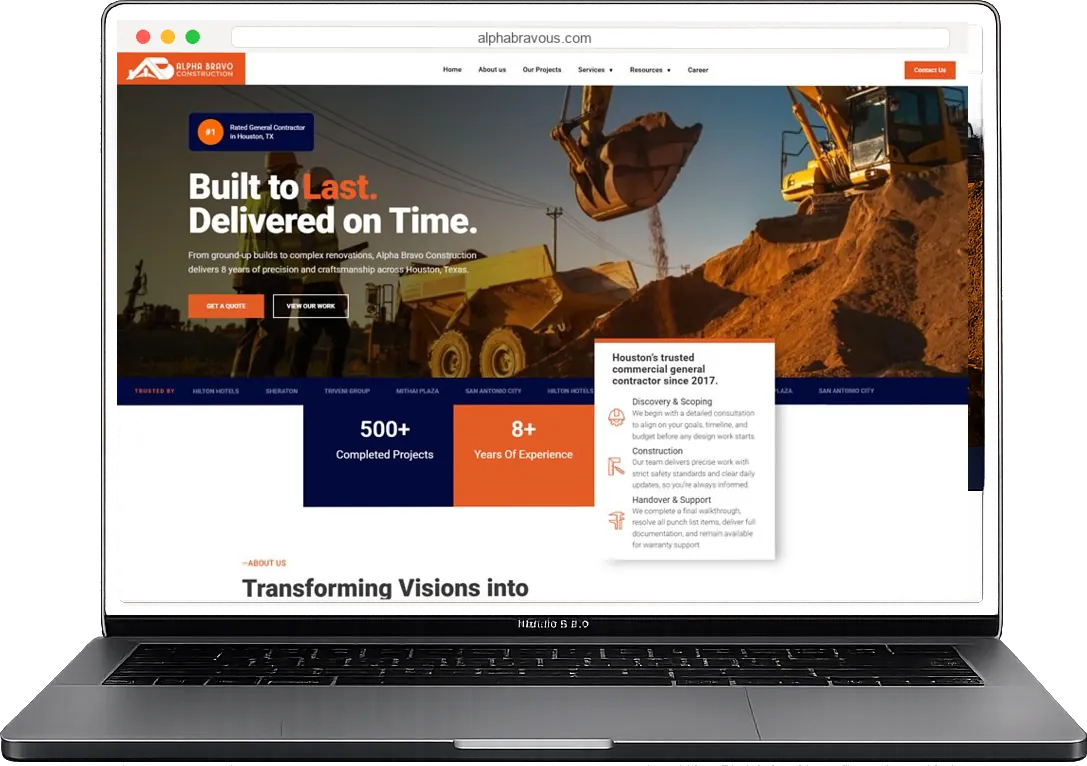 Alpha Bravo Construction website shown on a laptop